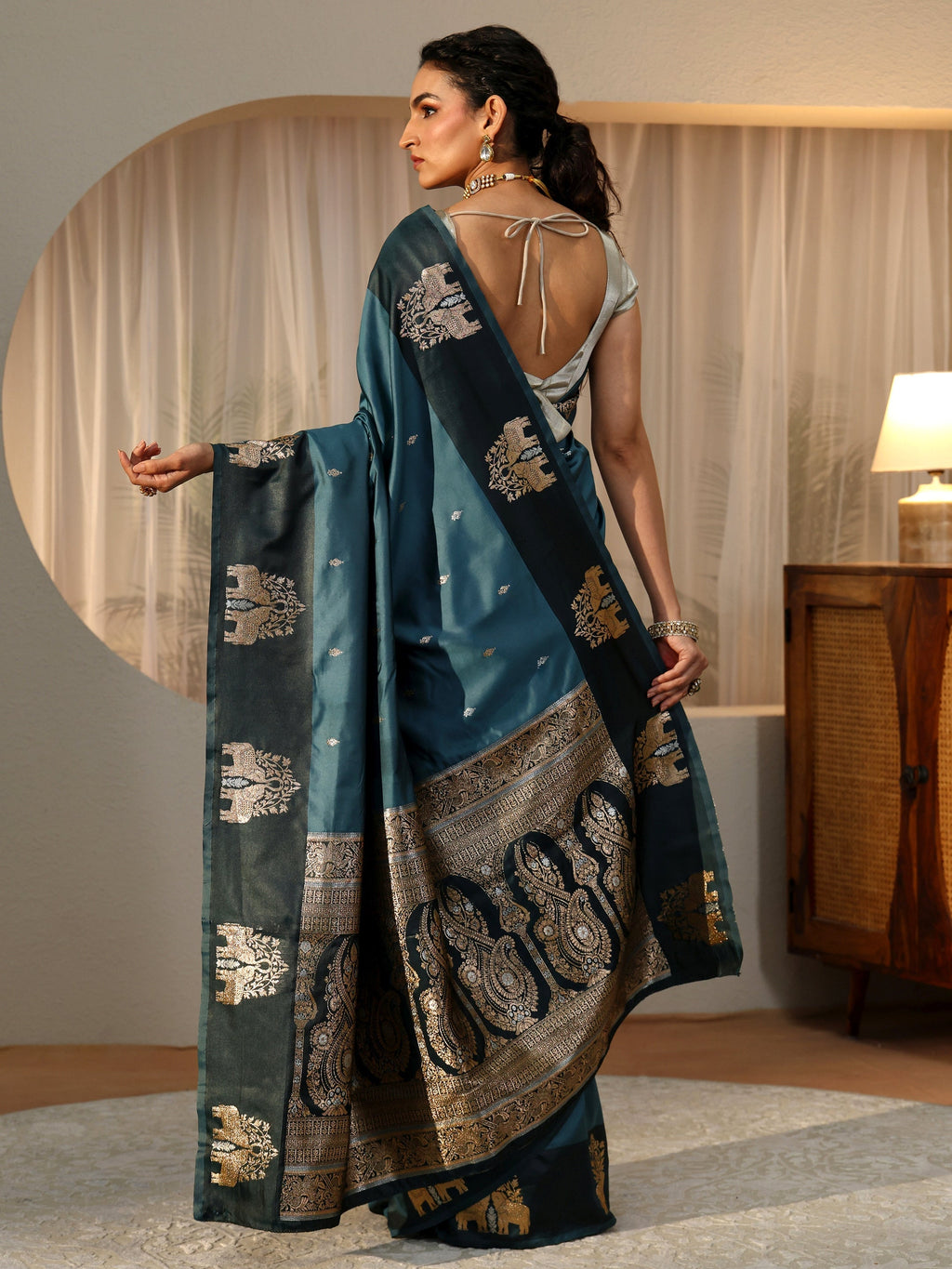 Teal Blue Elephant Woven Design Silk Blend Saree