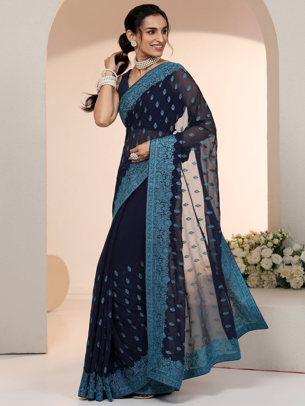 Navy Embroidered Georgette Saree with Ethnic Motifs
