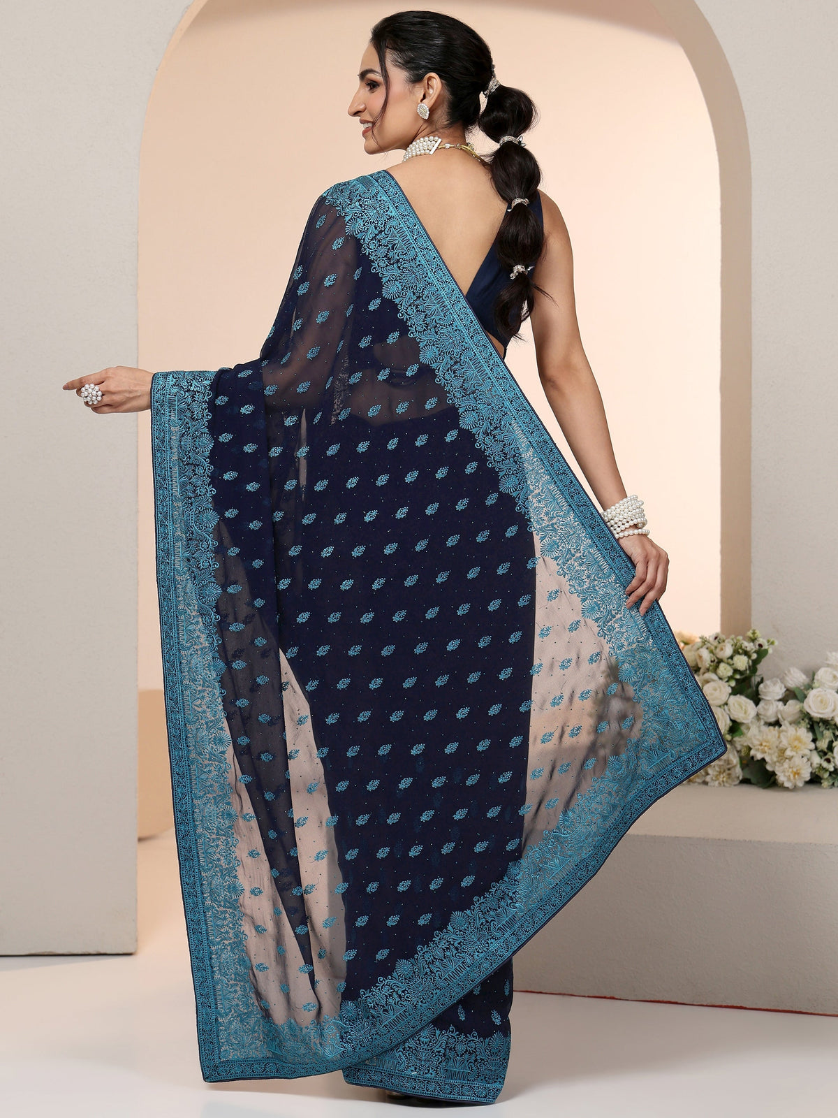 Navy Embroidered Georgette Saree with Ethnic Motifs