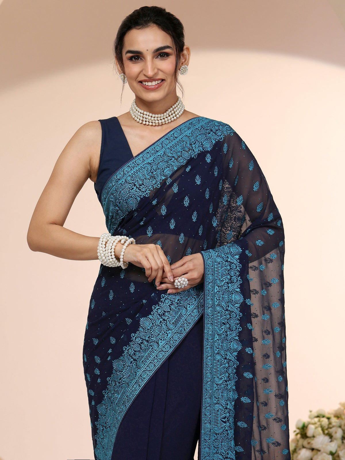 Navy Embroidered Georgette Saree with Ethnic Motifs