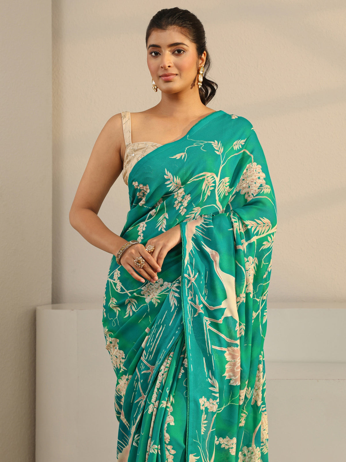 Green Floral Printed Georgette Tassel Saree With Unstitched Blouse Piece