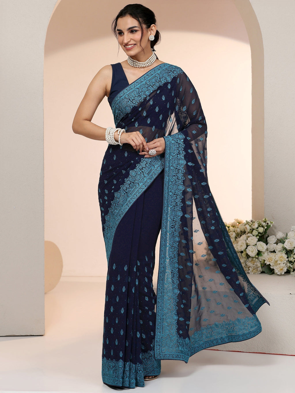 Navy Embroidered Georgette Saree with Ethnic Motifs